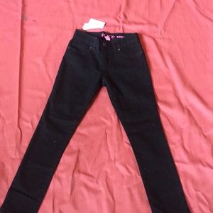 Black wash skinny jeans *NEVER WORN*
